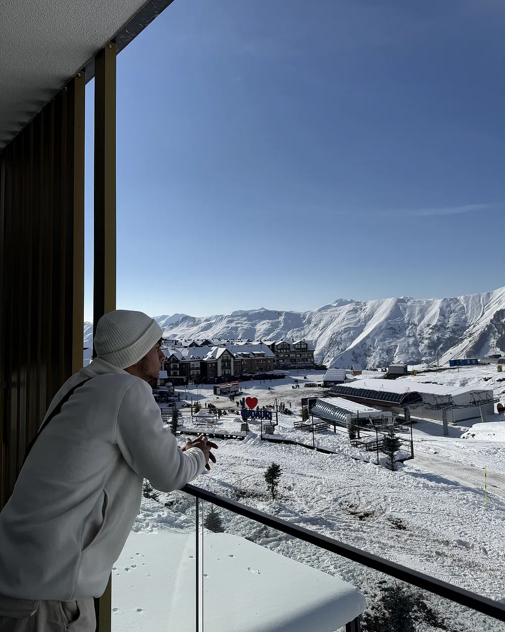 Nasif at Gudauri looking out over the snowy Caucasus
